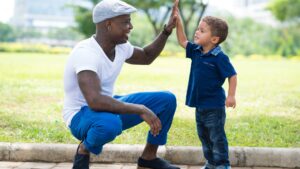 Father-Son Bond: Celebrating the Inimitable Magic of Their First High-Five!